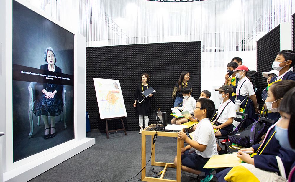 Children listen to atomic bomb testimony via AI