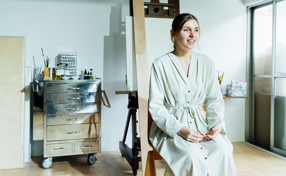 インタビューに応じるアデリンさん