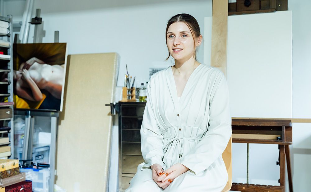 象徴するエピソードを語るアデリンさん