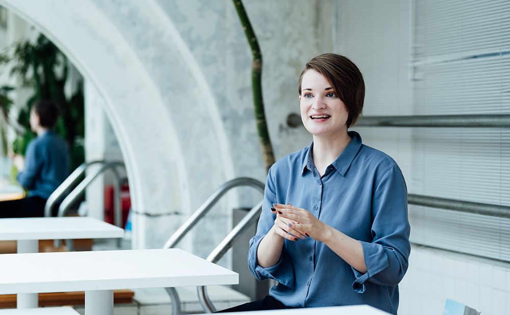 Rachel responds to an interview with a smile.